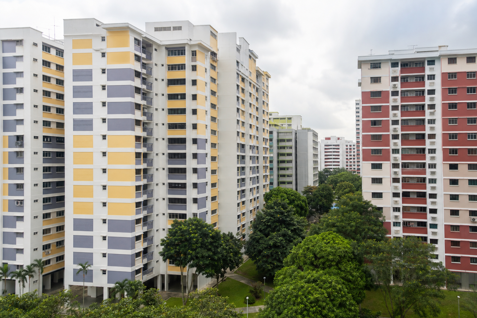 Colourful HDB residential blocks with void deck in Singapore's west sector